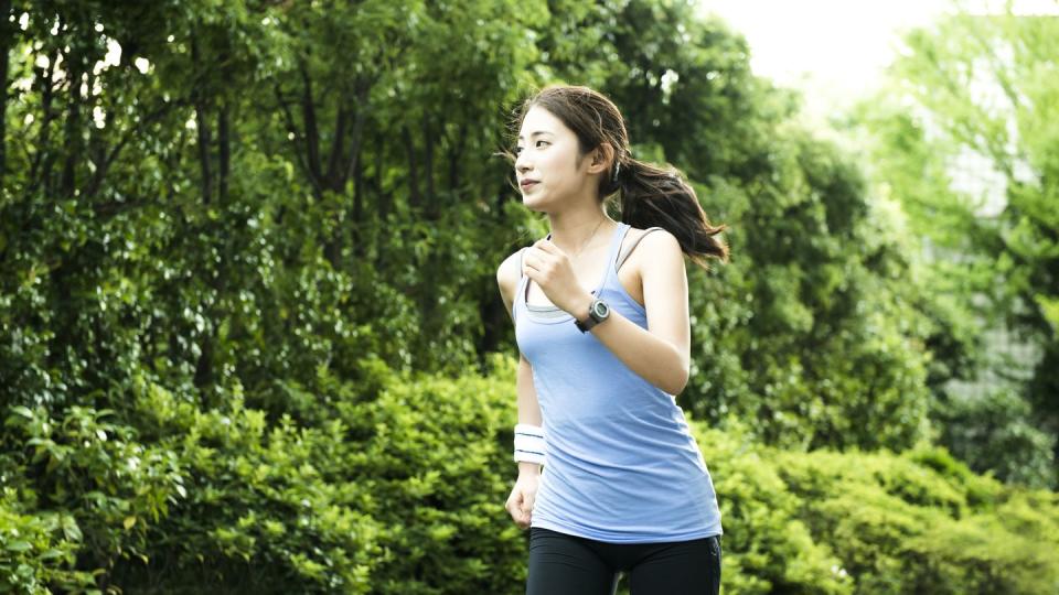 young woman jogging in park