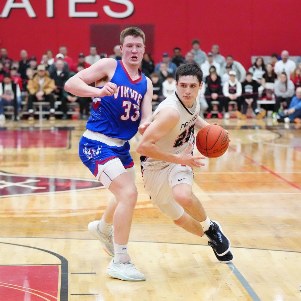 Pewaukee's Nick Janowski (25) breaks past Wisconsin Lutheran's Kon Knueppel (33) during the game at Pewaukee, Friday, Feb. 9, 2024.