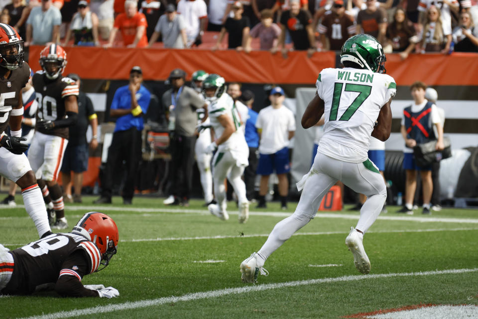 New York Jets wide receiver Garrett Wilson (17) takes a Josh Rosen pass into the end zone for a touchdown against the Cleveland Browns during the second half of an NFL football game, Sunday, Sept. 18, 2022, in Cleveland. (AP Photo/Ron Schwane)