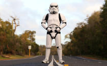 PERTH, AUSTRALIA - JULY 15: Stormtrooper Paul French is pictured on day 5 of his over 4,000 kilometre journey from Perth to Sydney approximately 25 kilometres from Mandurah on July 15, 2011 in Perth, Australia. French aims to walk 35-40 kilometres a day, 5 days a week, in full Stormtrooper costume until he reaches Sydney. French is walking to raise money for the Starlight Foundation - an organisation that aims to brighten the lives of ill and hostpitalised children in Australia. (Photo by Paul Kane/Getty Images)