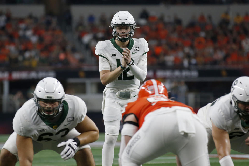 FILE - Baylor quarterback Blake Shapen (12) waits for the snap during the first half of the Big 12 Championship NCAA college football game against Oklahoma State in Arlington, Texas, Saturday, Dec. 4, 2021. The Big 12 is going into its 12th and final season as a 10-team conference. (AP Photo/Roger Steinman, File)