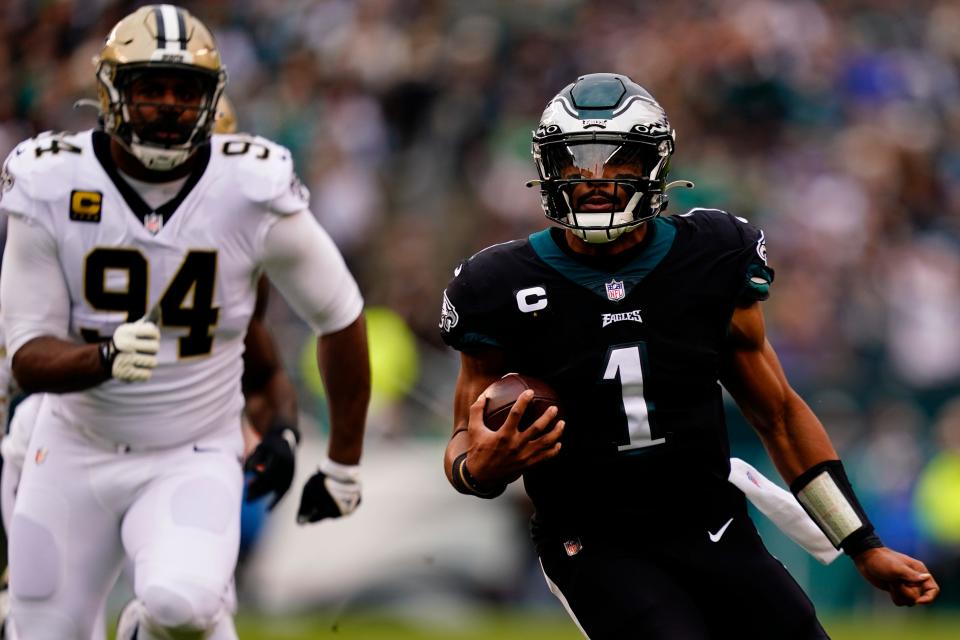 Philadelphia Eagles' Jalen Hurts plays during the first half of an NFL football game against the New Orleans Saints, Sunday, Nov. 21, 2021, in Philadelphia. (AP Photo/Derik Hamilton)