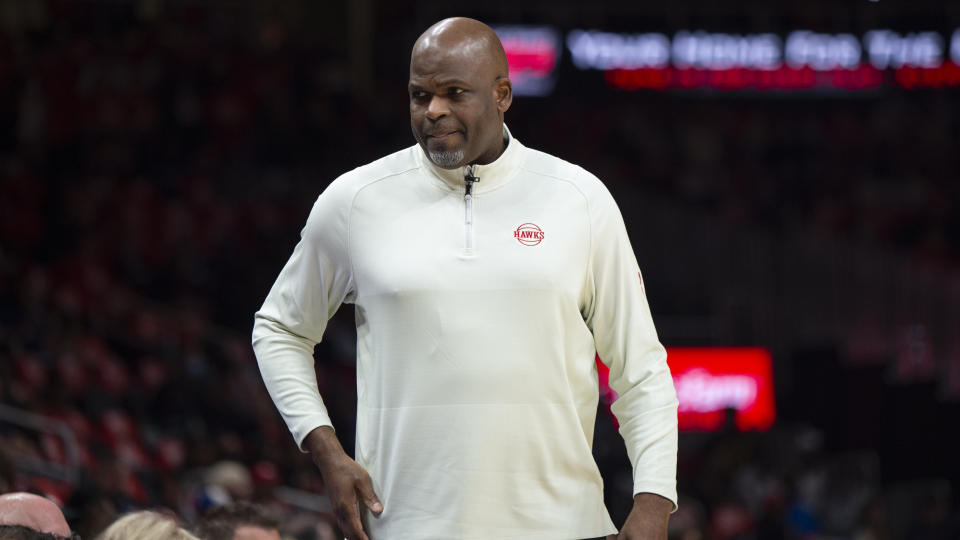 Atlanta Hawks head coach Nate McMillan walks the baseline during the first half of an NBA basketball game against the Dallas Mavericks on Thursday, Oct. 21, 2021, in Atlanta. (AP Photo/Hakim Wright Sr.)