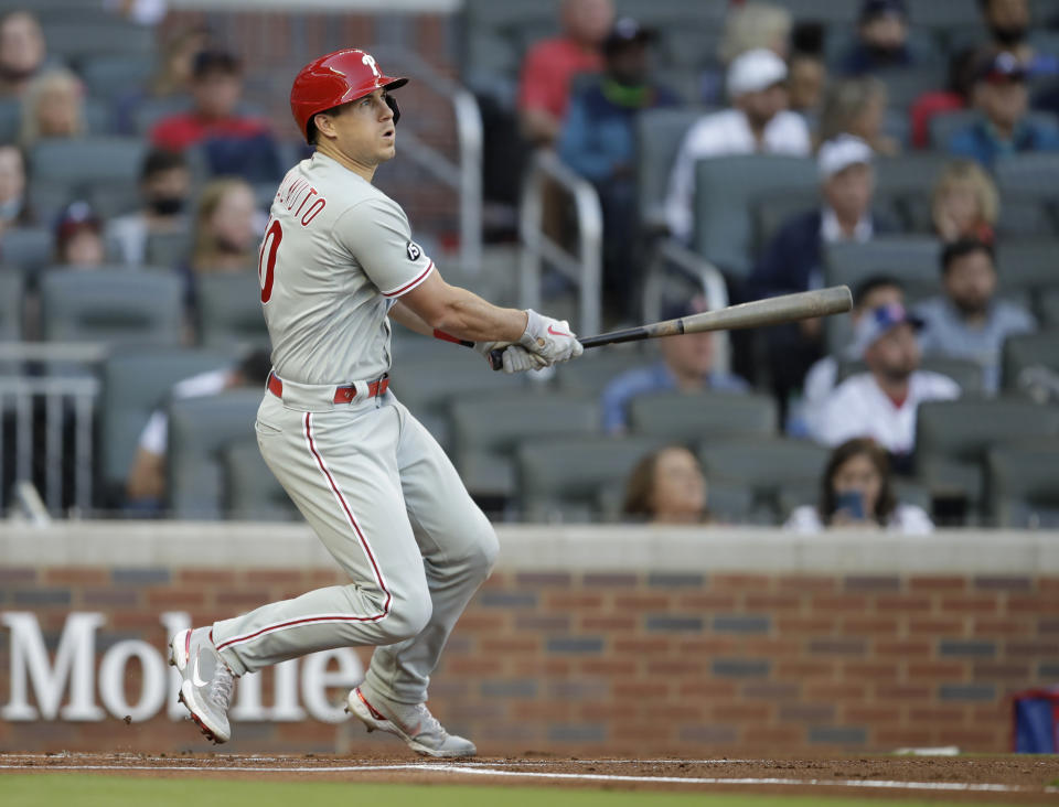 Philadelphia Phillies' J.T. Realmuto watches his double off Atlanta Braves pitcher Ian Anderson in the first inning of a baseball game Saturday, May 8, 2021, in Atlanta. (AP Photo/Ben Margot)