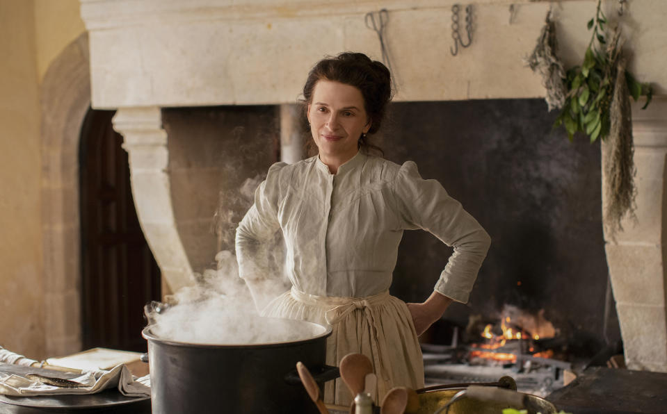 This image released by IFC Films shows Juliette Binoche in a scene from "The Taste of Things." (Carole Bethuel/IFC Films via AP)