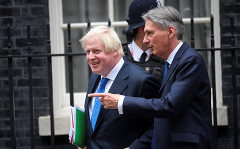 Britain's Foreign Secretary Boris Johnson and Chancellor of the Exchequer Philip Hammond - Credit: REUTERS/Toby Melville