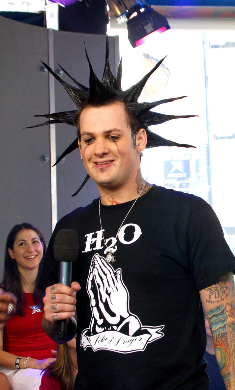 Benji sporting long spiked hair and running black eyeliner