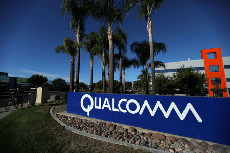 FILE PHOTO: A sign on the Qualcomm campus is seen in San Diego, California, U.S. November 6, 2017. REUTERS/Mike Blake/File Photo