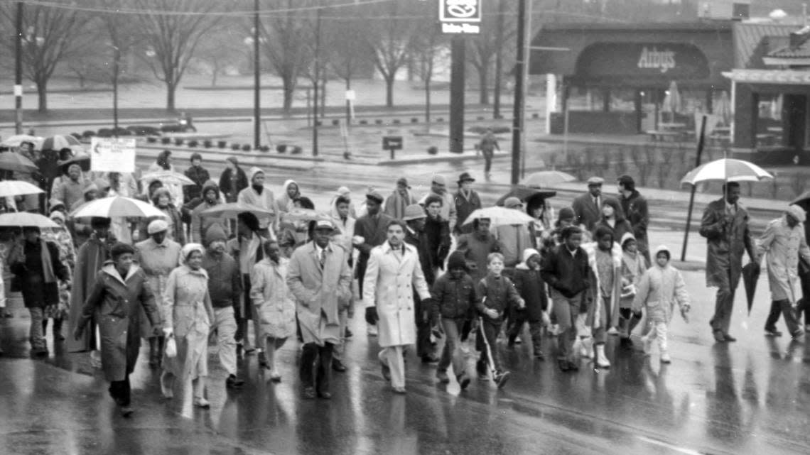 About 2,000 people marched down South Limestone Jan. 18, 1987 in Lexington, Ky. on the eve the second national observance of Martin Luther King Jr. The 1-mile Unity March march went around the University of Kentucky campus, featured a candlelight memorial service at Memorial Coliseum.