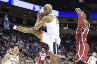 Virginia forward Mamadi Diakite (25) grabs a rebound against Oklahoma forward Kristian Doolittle, right, during the first half of a second-round game in the NCAA men's college basketball tournament Sunday, March 24, 2019, in Columbia, S.C. (AP Photo/Sean Rayford)