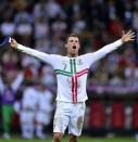 Portuguese forward Cristiano Ronaldo celebrates after winning the Euro 2012 football championships quarter-final match between the Czech Republic and Portugal at the National Stadium in Warsaw. Portugal won 1-0