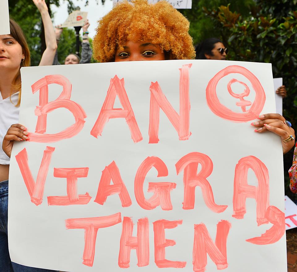 A Pro-choice protest took place on North Church Street in downtown Spartanburg on June 28, 2022.  The protest took place just days after the Supreme Court's reversed the landmark case Roe v. Wade decision issued on January 22, 1973. Bell Bradley from Columbia, center, at the protest.