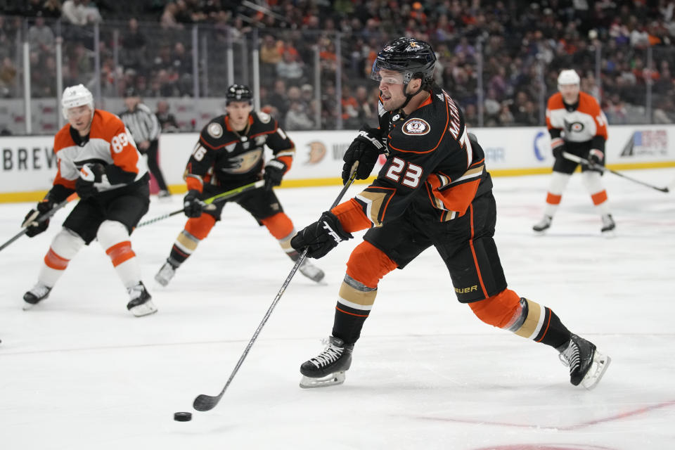 Anaheim Ducks center Mason McTavish (23) shoots during the first period of an NHL hockey game against the Philadelphia Flyers in Anaheim, Calif., Friday, Nov. 10, 2023. (AP Photo/Ashley Landis)