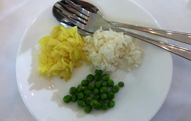 An AFC Studio resident chef's sample of a typical meal for a poor family in Asian third world countries. It consists of cabbages, peas and rice, which has poor nutritional value. (Yahoo! Photo)