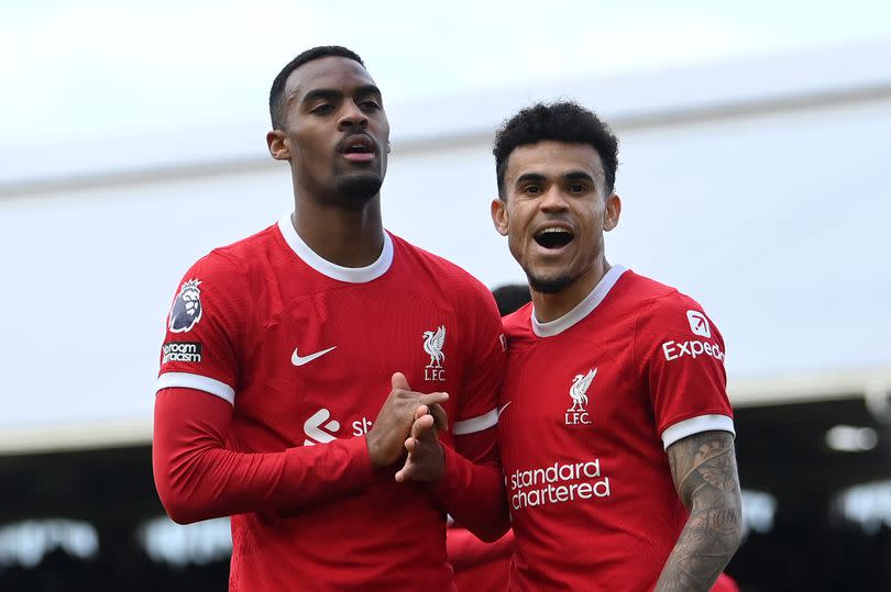 Ryan Gravenberch and Luis Díaz of Liverpool celebrate the Reds going 2-1 ahead against Fulham.