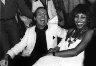 <p>Fashion photographer Francesco Scavullo and singer Tina Turner join the party during an evening at Studio 54 in 1977. </p>