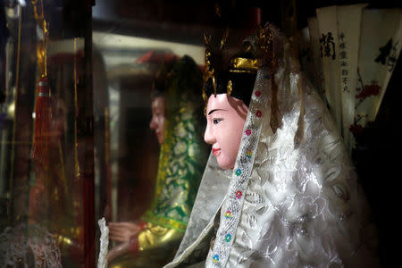 Statues of a goddess are seen during a Hau Dong ceremony at a temple in Hai Duong province, Vietnam, April 25, 2017. REUTERS/Kham