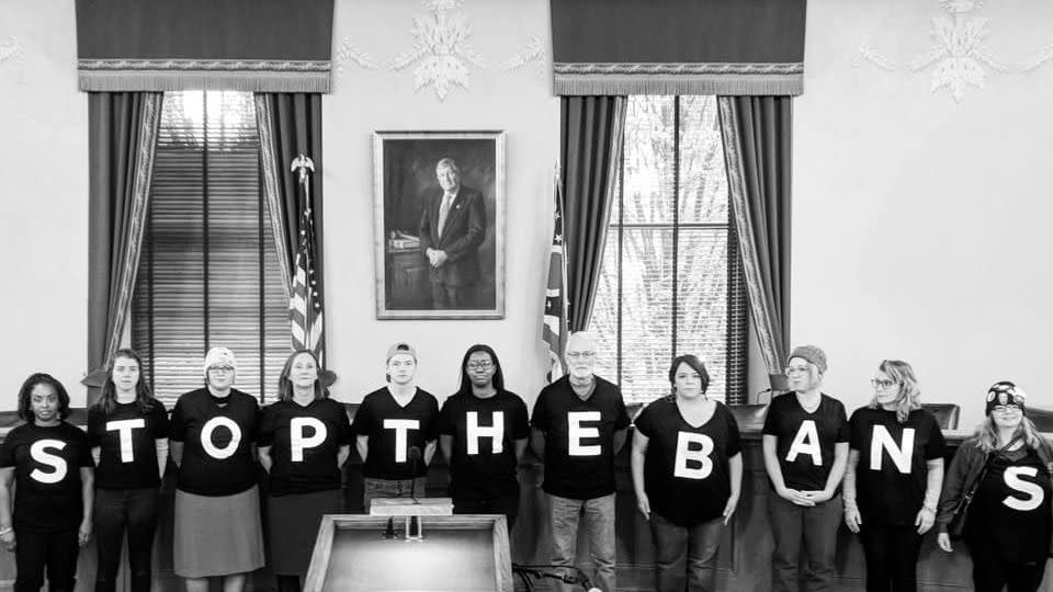 ohio womens alliance executive director and co founder rhiannon carnes pictured with others at a demonstration at the ohio statehouse