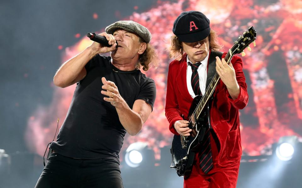 Brian Johnson and Angus Young of AC/DC perform on stage - Martin Philbey 