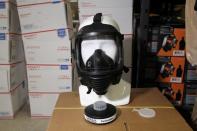 A mask and filter are seen in the warehouse of Mira Safety, a tactical gear manufacturer that says it is seeing an uptick in sales for its CM-6M tactical gas mask and its ParticleMax P3 virus filter as a result of the coronavirus, in Austin