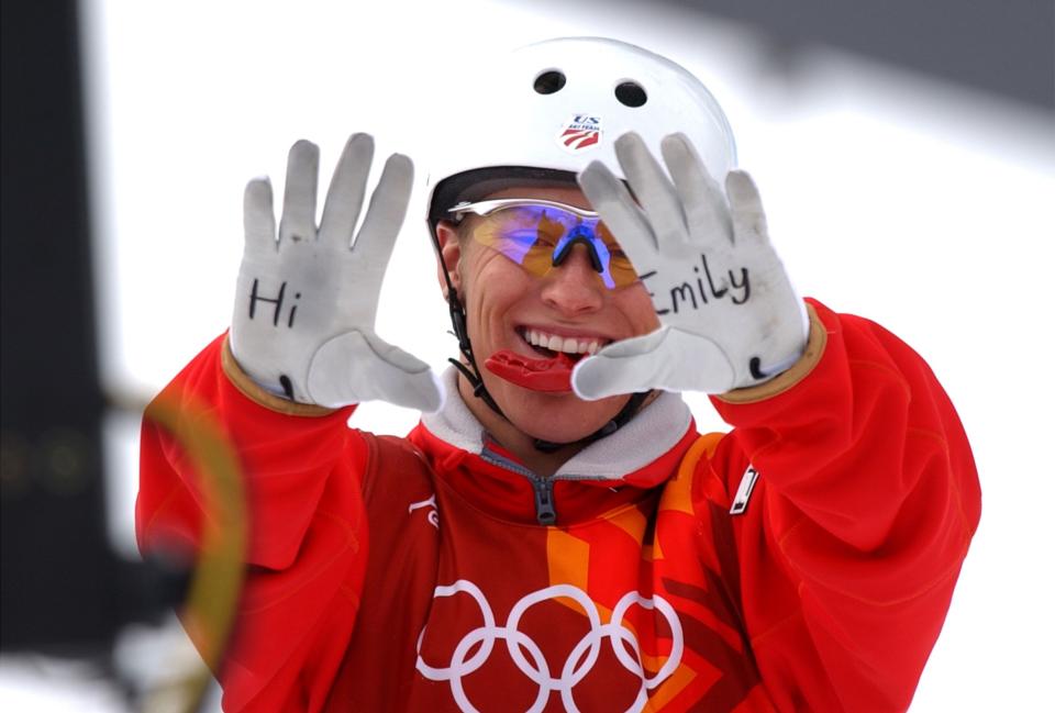 USA’s Jeret Peterson waves at the camera with a message for teammate Emily Cook before his second jump at the men’s aerials qualification at Deer Valley Resort on Saturday, Feb. 16, 2002. Cook was on the U.S. Olympic freestlye team but was sidelined with an injury. Peterson took her spot on the team and qualified for the finals on Monday with a score of 237.39. | Jason Olson, Deseret News