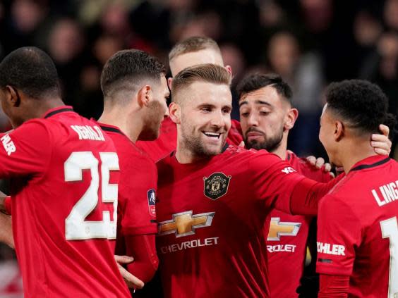 Manchester United celebrate their opening goal (Reuters)