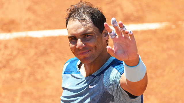 Rafa Nadal (pictured) thanks the Italian Open crowd after defeating John Isner.