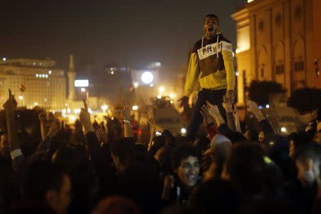 Anti-Mubarak protesters shout slogans against government and military rules after the verdict of former Egyptian President Hosni Mubarak's trial, around Abdel Moneim Riad square in downtown Cairo November 29, 2014. REUTERS/Amr Abdallah Dalsh