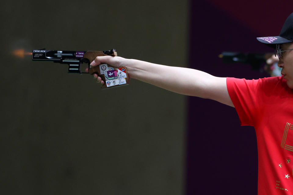 <p>ASAKA, JAPAN - AUGUST 02: Yuehong Li of Team China competes in 25m Rapid Fire Pistol Men's Finals on day ten of the Tokyo 2020 Olympic Games at Asaka Shooting Range on August 02, 2021 in Asaka, Saitama, Japan. (Photo by Kevin C. Cox/Getty Images)</p> 