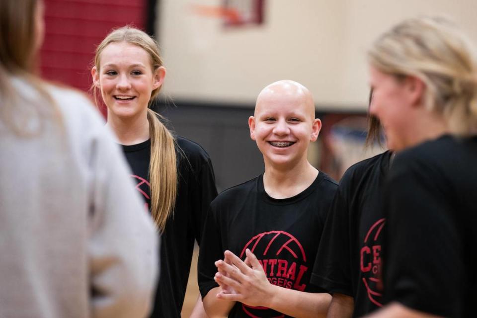 Central volleyball player Allison Montoya listens to the coach along with her teammates during practice Sept. 29, 2021, in Keller.