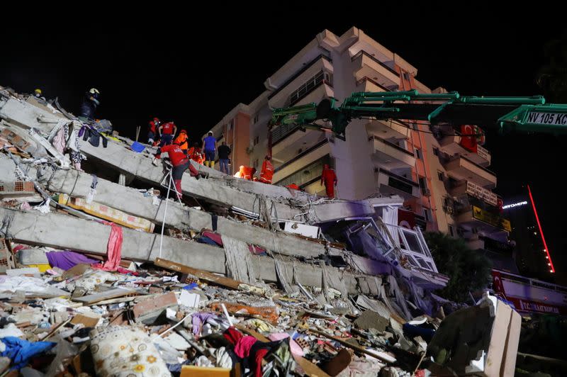 Rescue operations take place on a site after an earthquake struck the Aegean Sea, in the coastal province of Izmir