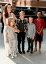 <p>Ange with kids, Vivienne, Shiloh, Knox, and Zahara attend The Breadwinner premiere during the 2017 Toronto International Film Festival on September 10, 2017 in Toronto. Source: Getty </p>