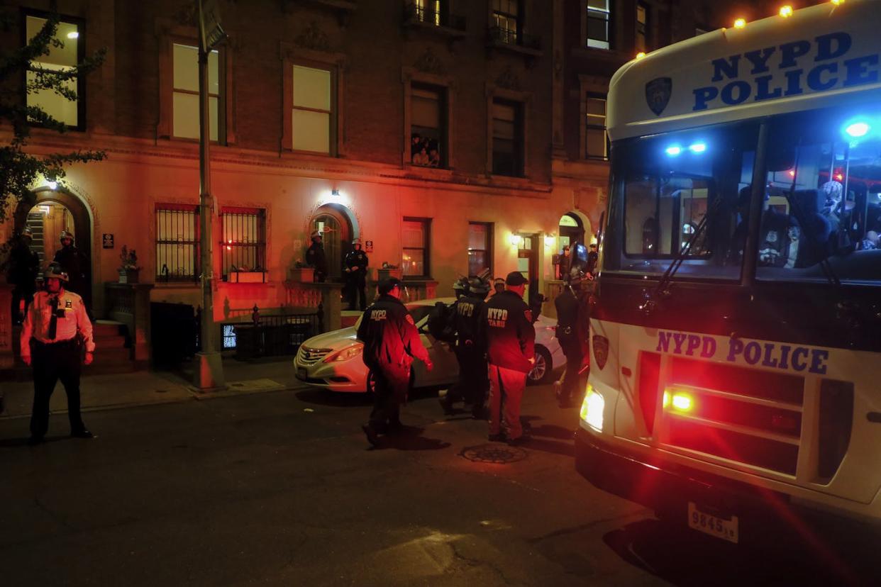 Members of the New York Police Department load arrested protesters from Columbia University onto a bus on April 30, 2024. (AP Photo/Julius Motal)