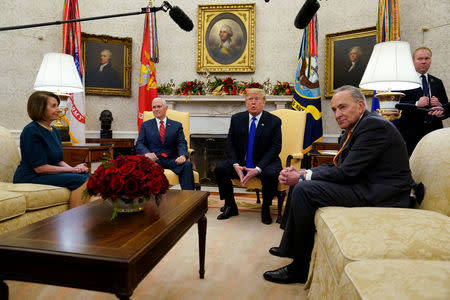 U.S. President Donald Trump meets with Senate Democratic Leader Chuck Schumer (D-NY) and House Democratic Leader Nancy Pelosi (D-CA) at the White House in Washington, U.S., December 11, 2018. REUTERS/Kevin Lamarque