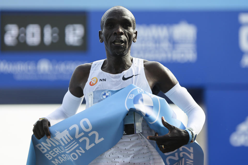 FILE - Kenya's Eliud Kipchoge crosses the line to win the Berlin Marathon in Berlin, Germany, Sept. 25, 2022. A 38-year-old who has been collecting marathon victories since 2013, Kipchoge will make his Boston Marathon debut on Monday, April 17, 2023, in the 127th edition of the world’s longest-running long run. A victory would give him wins in an unprecedented five of the six major marathons. (AP Photo/Christoph Soeder, File)