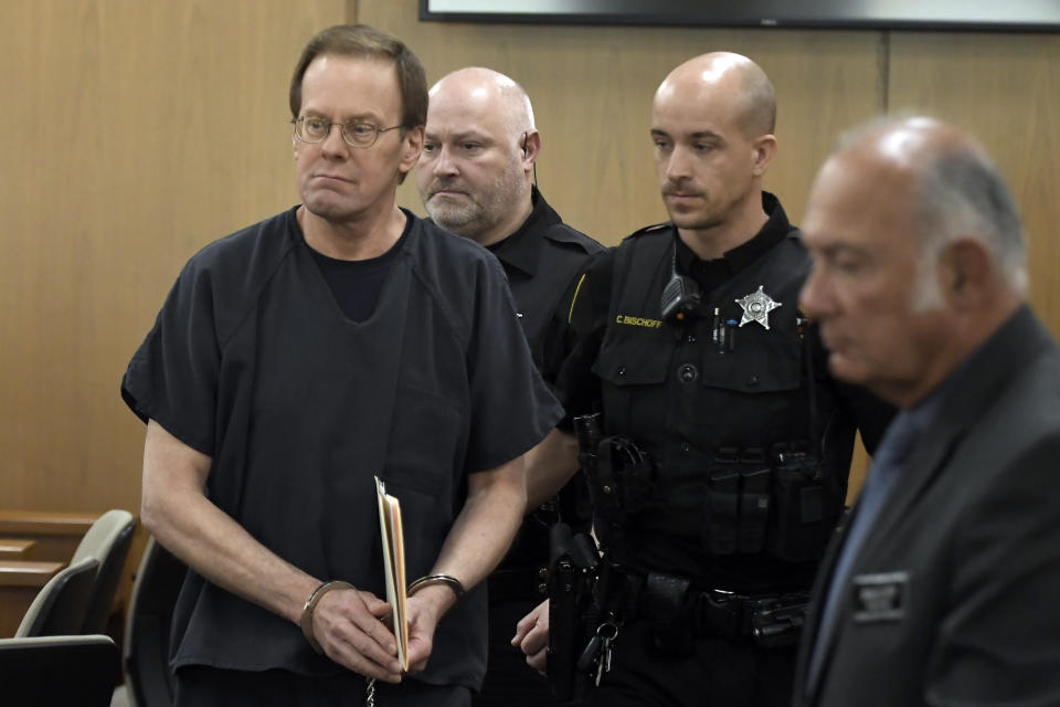 Mark Jensen makes his way into the courtroom for his sentencing hearing, Friday, April 14, 2023, in Kenosha, Wis. The Wisconsin Supreme Court ruled in 2021 that Jensen deserved a new trial in the 1998 death of his wife Julie Jensen, who was poisoned with antifreeze. (Sean Krajacic/The Kenosha News via AP, Pool)