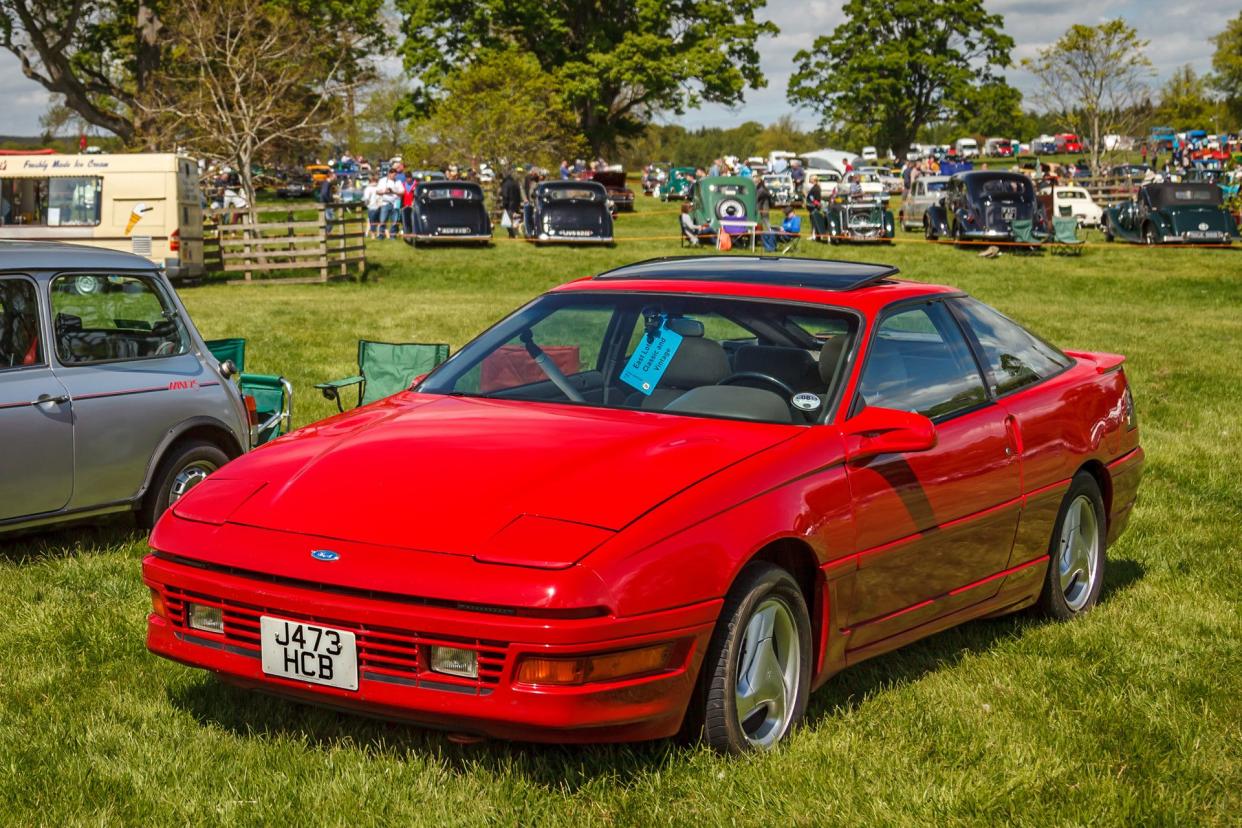 Red 1991 Ford Probe - J473 HCB - seen at the 41st Scottish Borders Historic Motoring Extravaganza, held at Thirlestane Castle, Lauder, Scotland, June 2013.