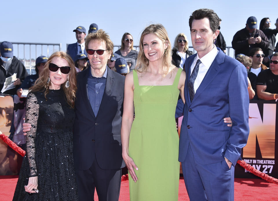 Linda Bruckheimer, from left, producer Jerry Bruckheimer, Kristin Kosinski and director Joseph Kosinsk arrive at the world premiere of "Top Gun: Maverick" on Wednesday, May 4, 2022, at the USS Midway in San Diego. (Photo by Jordan Strauss/Invision/AP)