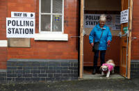 <p>A voter leaves the polling station with her dog on general election day in Congleton, Britain, June 8, 2017. (Photo: Paul Childs/Reuters) </p>