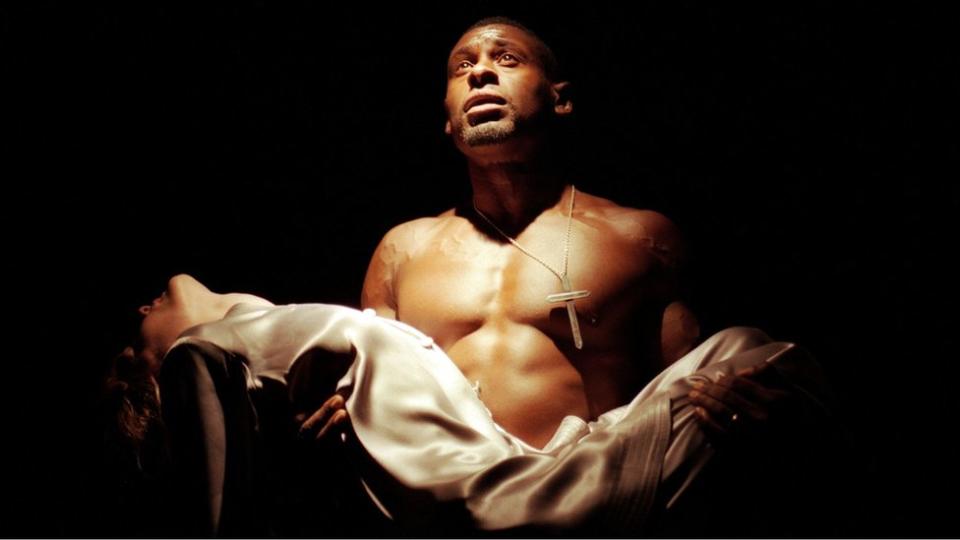 David Harewood (seen here holding Desdemona acted by Claire Skinner) was the first black actor to play Othello at the National Theatre in 1997