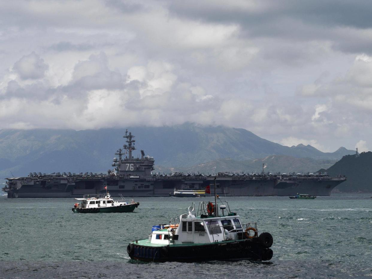 USS Ronald Reagan is one of three aircraft carriers involved in display of military might: ANTHONY WALLACE/AFP/Getty Images