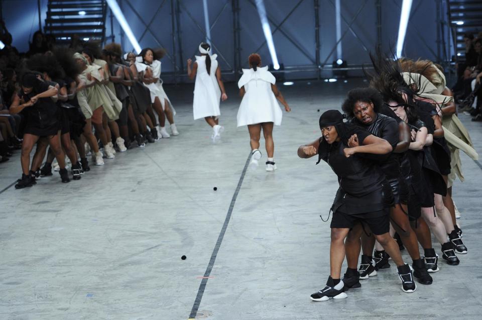 Models present creations as part of fashion designer Rick Owens ready-to-wear Spring/Summer 2014 fashion collection presented in Paris, Thursday, Sept. 26, 2013. (AP Photo/Zacharie Scheurer)