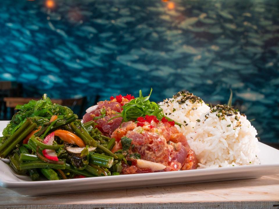 You can taste your way around Hawaii at Umekes Fishmarket Bar & Grill, one of Guy Fieri's spots on the Big Island.