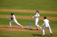 Cricket - India v England - Fourth Test cricket match - Wankhede Stadium, Mumbai, India - 10/12/16. India's Parthiv Patel is caught by England's Jonny Bairstow. REUTERS/Danish Siddiqui