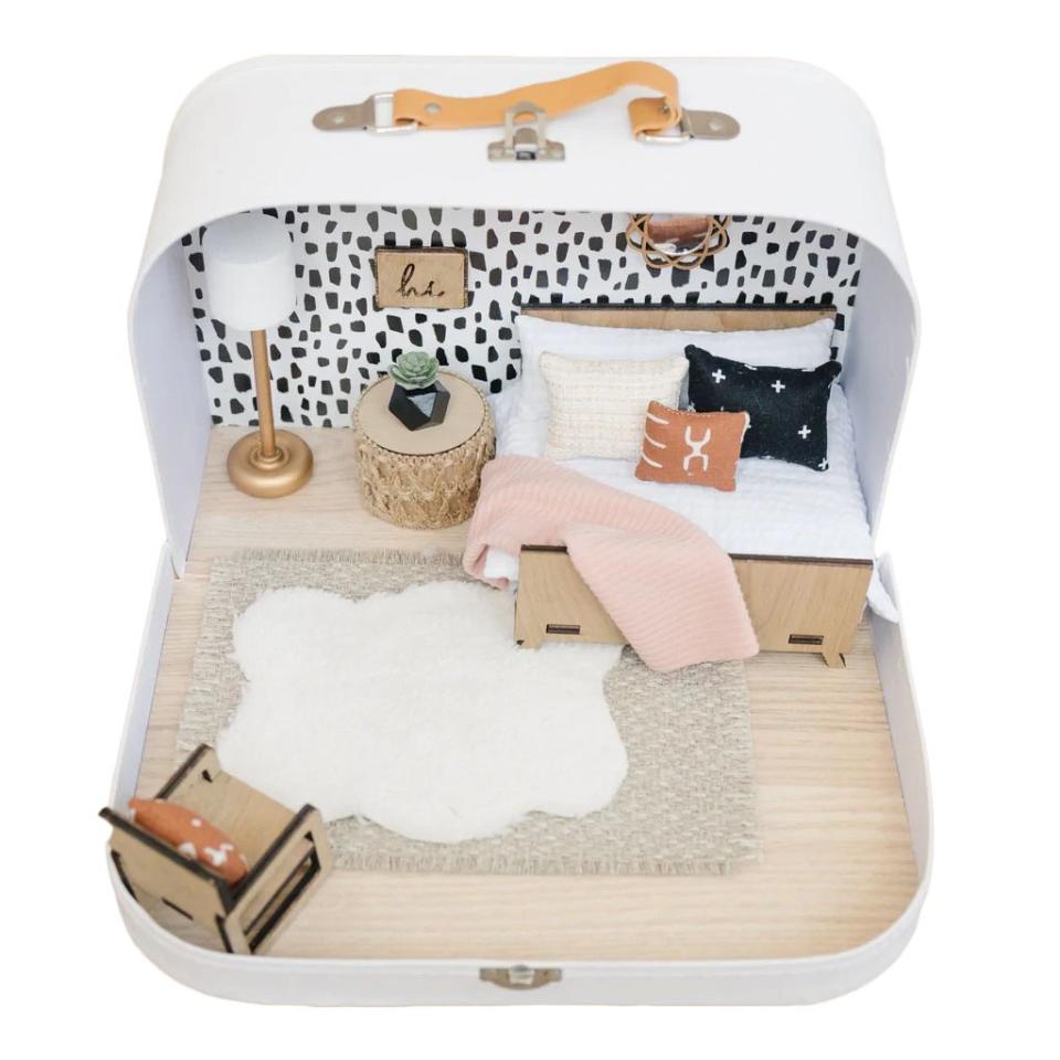 <p><a href="https://hopehavenco.com/products/bedroom-suitcase" rel="nofollow noopener" target="_blank" data-ylk="slk:Shop Now;elm:context_link;itc:0;sec:content-canvas" class="link ">Shop Now</a></p><p>Portable Dollhouse</p><p>hopehavenco.com</p><p>$118.00</p>