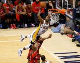 Apr 29, 2016; Indianapolis, IN, USA; Indiana Pacers forward Paul George (13) shoots the ball over Toronto Raptors guard Cory Joseph (6) during the second half in game six of the first round of the 2016 NBA Playoffs at Bankers Life Fieldhouse. Mandatory Credit: Brian Spurlock-USA TODAY Sports