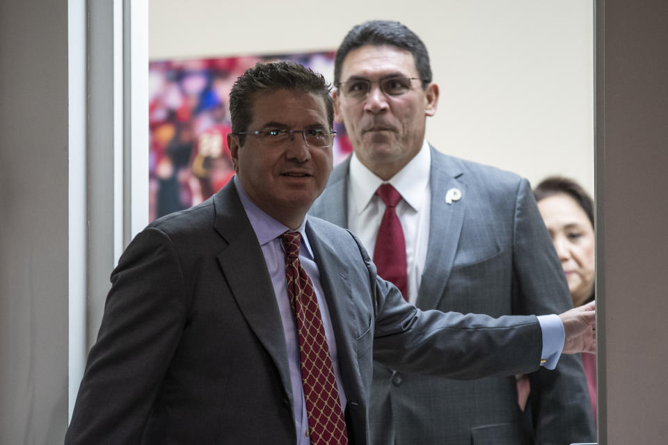 Washington owner Dan Snyder, left, arrives with new head coach Ron Rivera for a news conference at the team's NFL football training facility, Thursday, Jan. 2, 2020, in Ashburn, Va. (AP Photo/Alex Brandon)