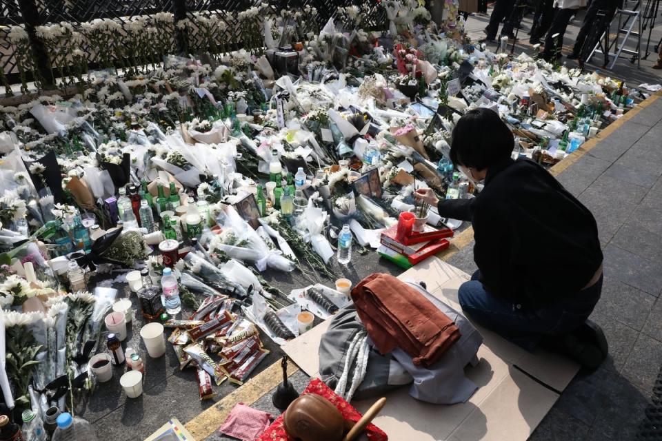 Citizens pay tribute near the scene of the stampede (Getty Images)