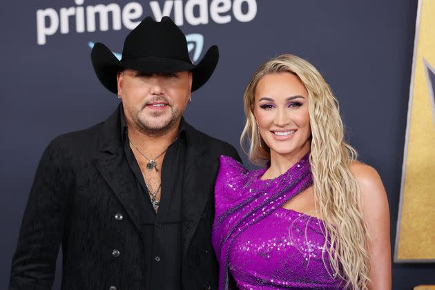 Jason (left) and Brittany Aldean. 