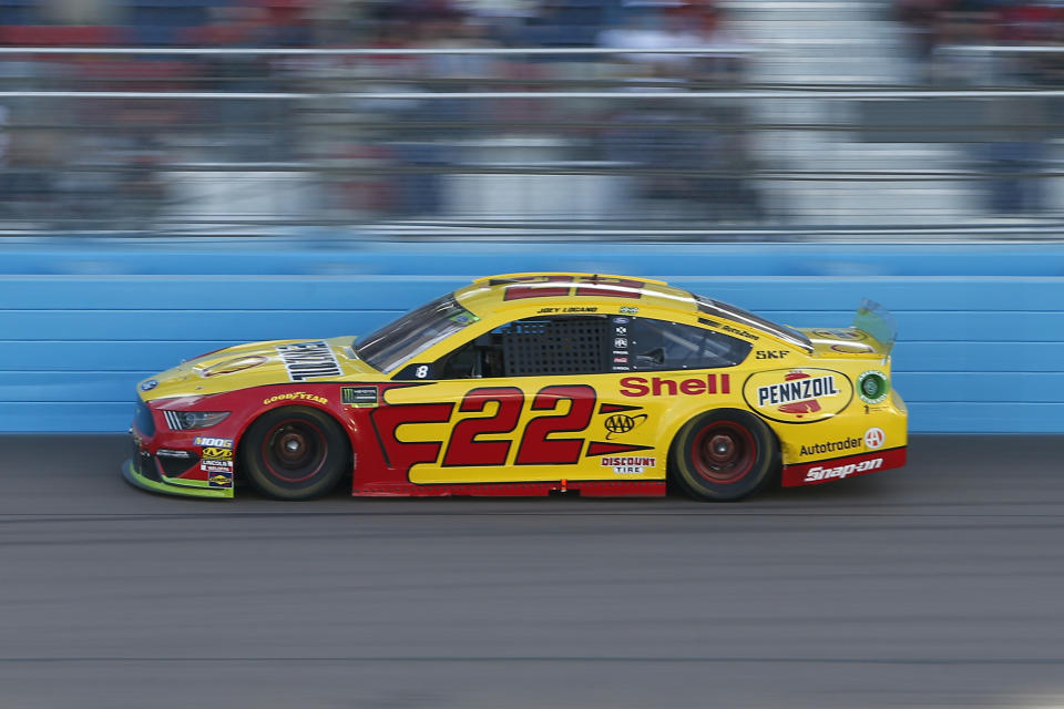 Joey Logano drives into Turn 4 during a NASCAR Cup Series auto race at ISM Raceway, Sunday, Nov. 10, 2019, in Avondale, Ariz. (AP Photo/Ralph Freso)